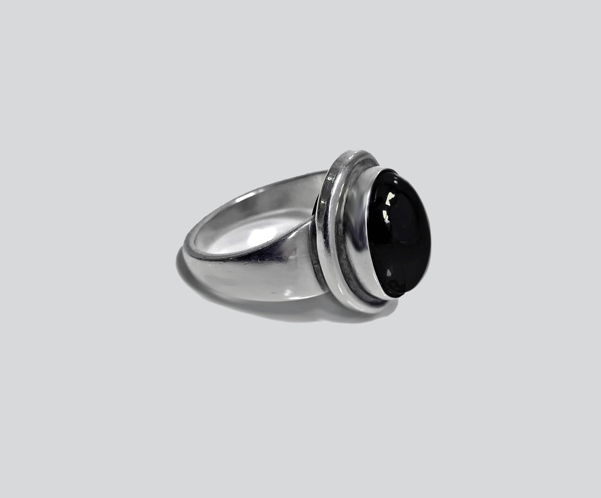 Georg Jensen Ladies Ring, designed by Harald Nielsen.The Ring bezel set with oval hematite.Full Georg Jensen marks to underside, post 1945, Denmark 46 B. Item Weight: 7.94 gm. Ring Size: 7.50. May be sized.