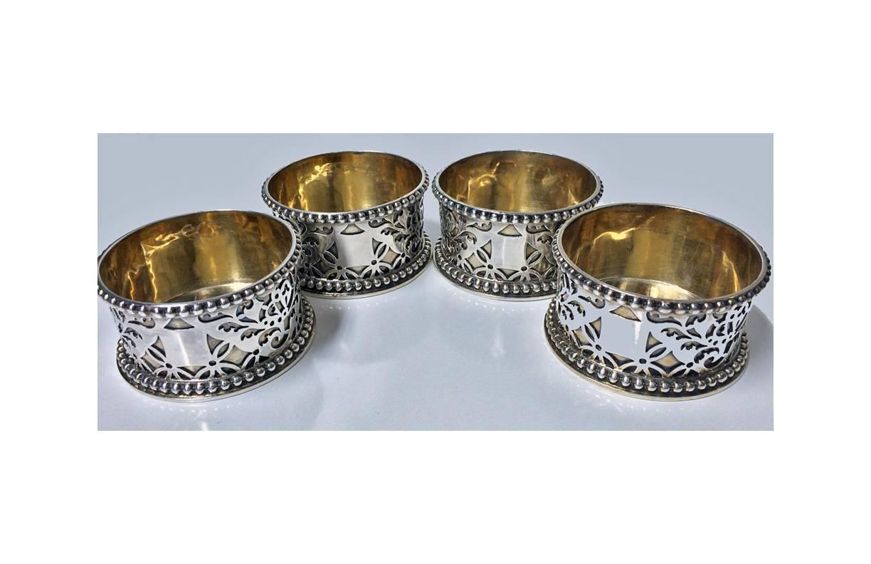 Exceptional and Rare set of 4 Silver Master Salts or Ramekins, Hunt & Roskell, late Storr & Mortimer, London 1854. The salts of cylindrical form with upper and lower bead rims, the central surround with applied cut card foliate design, vacant