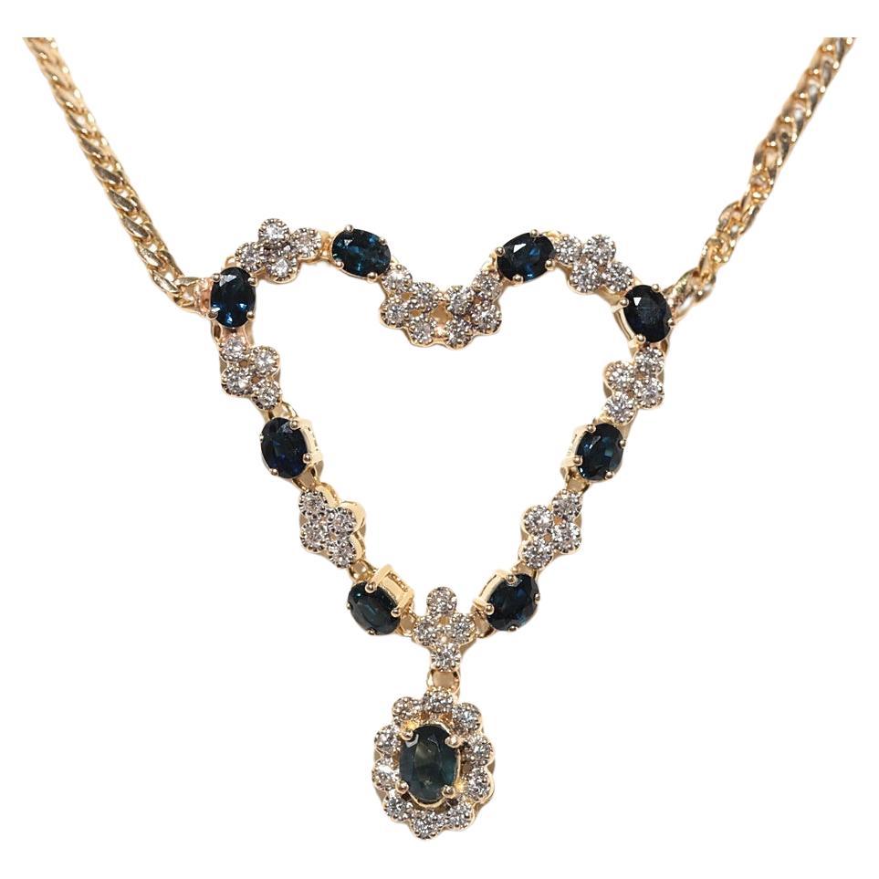 Collana decorata con diamanti naturali e zaffiri in oro 18 carati, vintage, anni '80 circa.