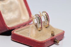 Vintage-Ohrring aus den 1980er Jahren aus 14-karätigem Gold mit einem natürlichen Diamanten und einem Rubin im Kaliber-Schliff
