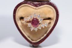 Bague vintage des années 1980, or 18 carats, diamant naturel et rubis taille ovale décoré