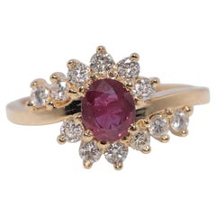 Bague vintage des années 1980, or 18 carats, diamant naturel et rubis taille ovale décoré