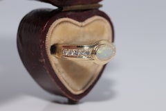 Bague vintage datant des années 1980, en or 14 carats, ornée de diamants naturels et d'opales