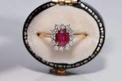 Dekorierter Vintage-Ring aus 18 Karat Gold mit natürlichem Diamanten im Ovalschliff und Rubin, ca. 1980er Jahre