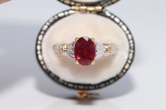 Vintage Circa 1990s 18k Gold Natural Oval Cut Ruby And Diamond Decorated Ring