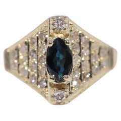 Bague vintage décorée en or 14 carats avec diamants naturels et saphirs des années 1980