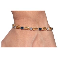 Vintage Circa 1990s 18k Gold Natural Diamond And Sapphire Tennis Bracelet