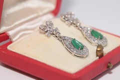Orecchino vintage a forma di fiocco, anni '70 circa, in oro 14k con diamante naturale e smeraldo taglio a pera