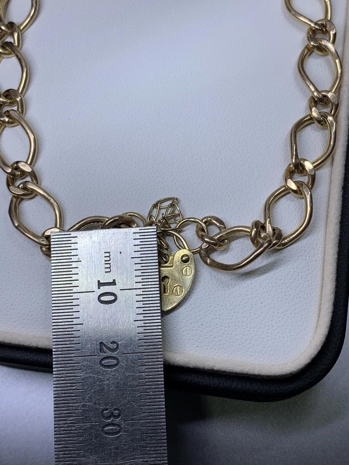 Bracelet en or jaune à maillons cubains et à grosses mailles en vente 4