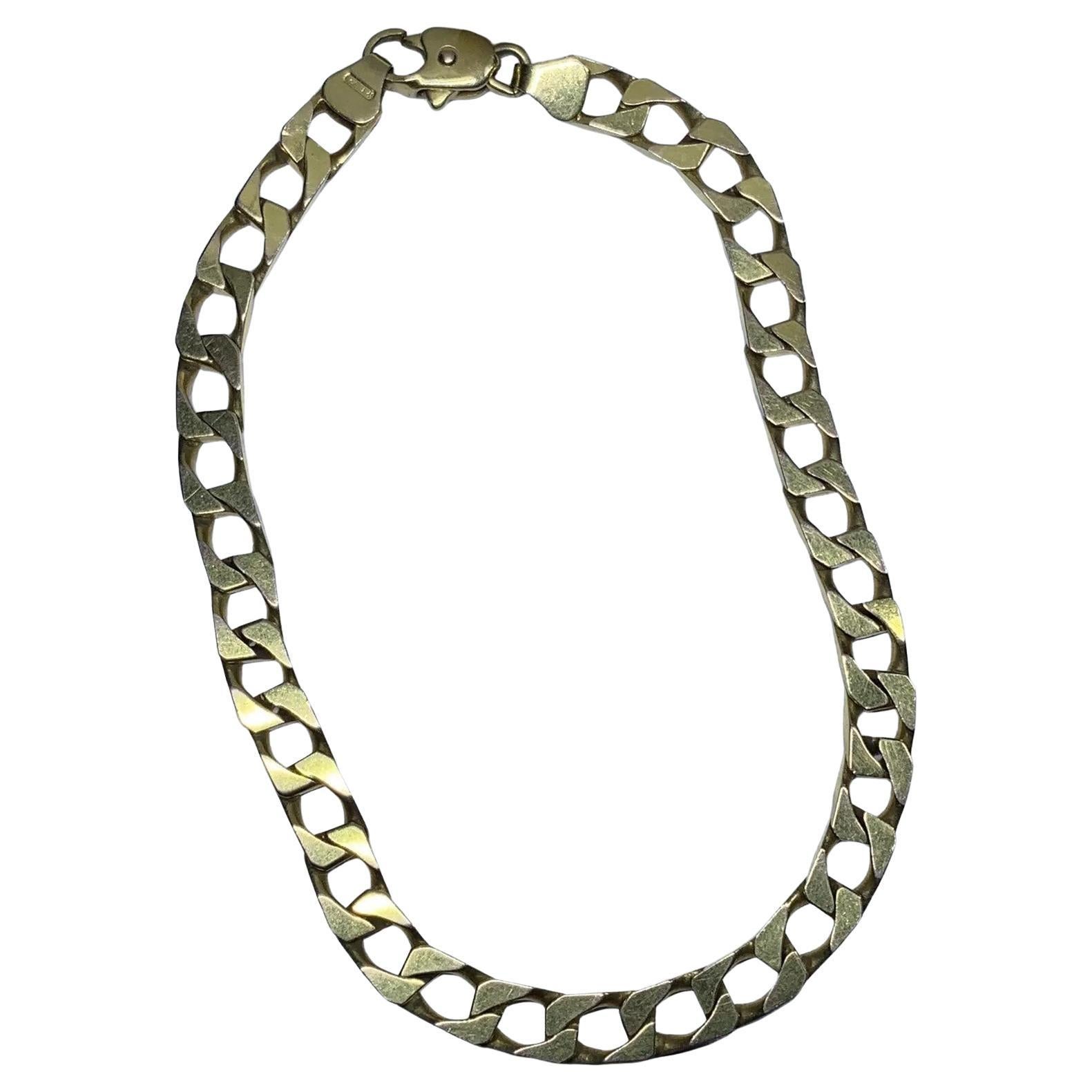 Bracelet massif en or jaune avec chaîne à maillons cubains et à grosses mailles