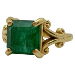 Bague en or jaune 14k avec émeraude