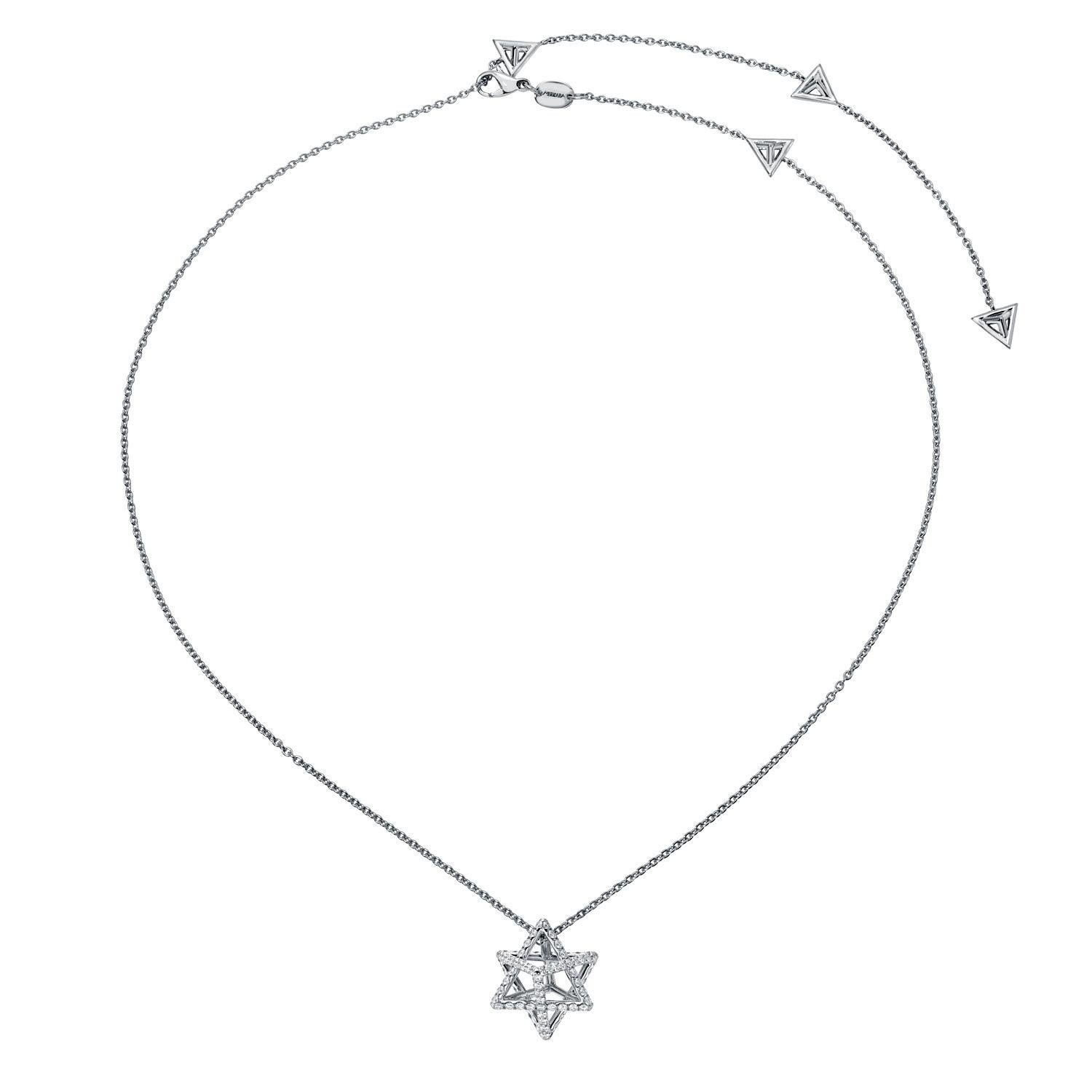 Ce collier Merkaba 3D Star of David est fabriqué en or blanc 18 carats et orné d'environ 1,12 carats de diamants ronds de taille brillant, de couleur F-G et de pureté VVS2-VS1. Mesurant 0,68
