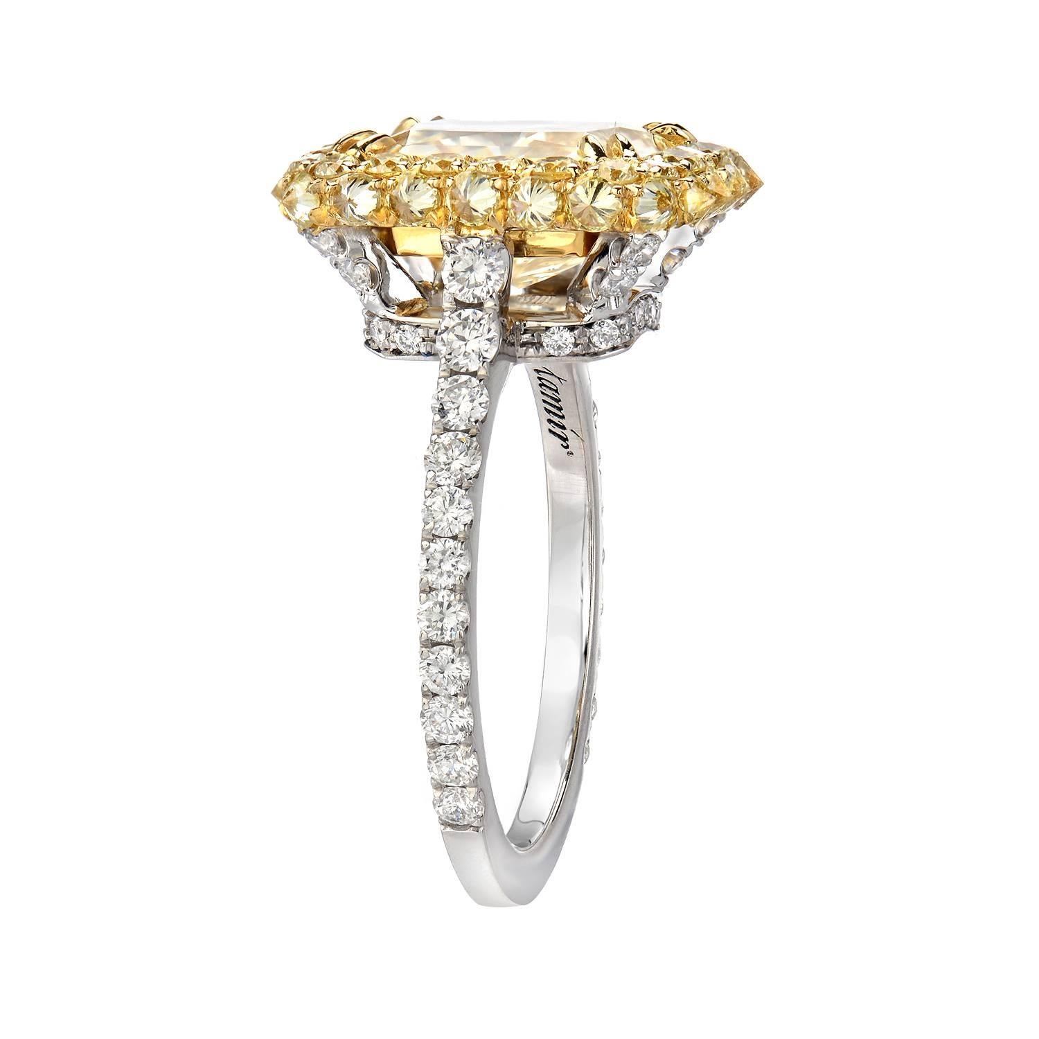 Supreme GIA certified 3.78 carat natural Fancy Light Yellow diamond radiant cut ring. This exceptional 3.78 carat diamond is surrounded by a total of 0.88 carat round brilliant fancy yellow diamonds, set inversely on the sides. The platinum shank is