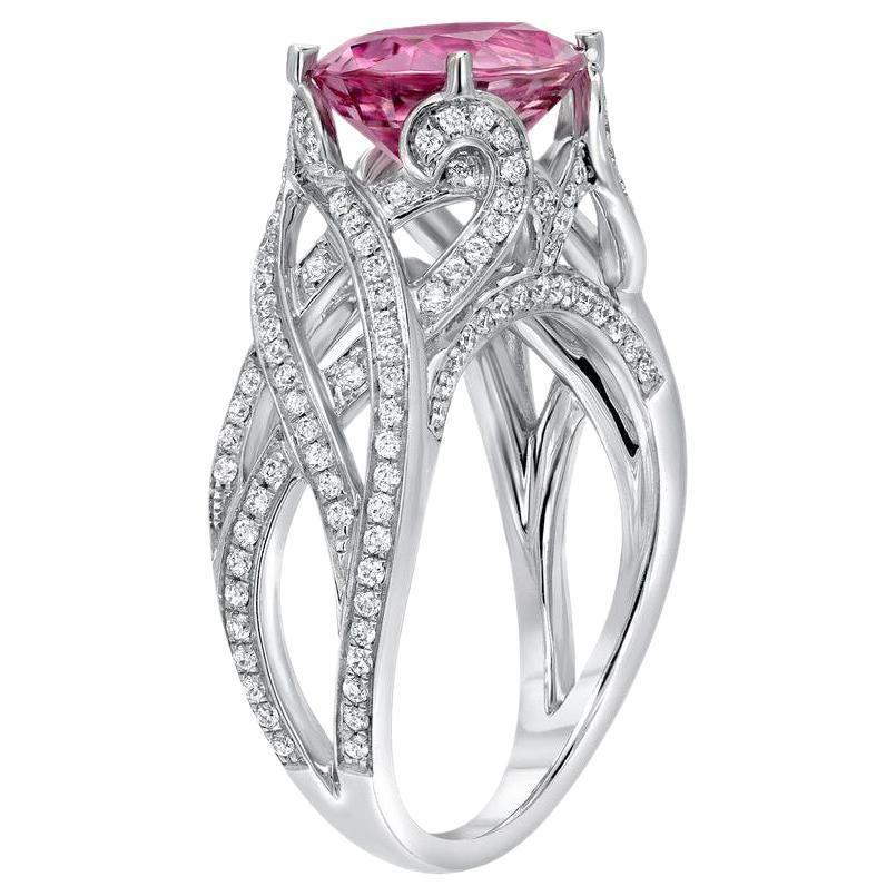 An exquisite, hard to find, 3.18 carat oval Pink Spinel, set in a 0.53 carat 18K white gold diamond ring. 
Size 6. Re-sizing is complimentary upon request. 
Returns are accepted and paid by us within 7 days of delivery.
Spinel is the celebrated