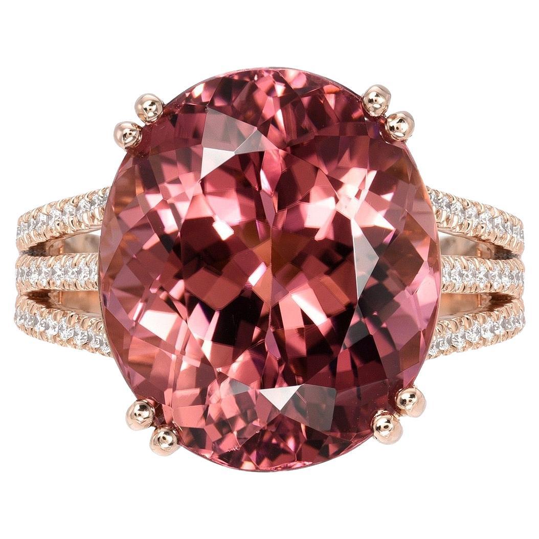 Splendid 11.20 carats Pink Tourmaline oval, set in a unique 0.37 carat total diamond, 18K rose gold ring.
Ring size 6.5. Resizing is complimentary upon request.
Returns are accepted and paid by us within 7 days of delivery.

Please FOLLOW the TAMIR