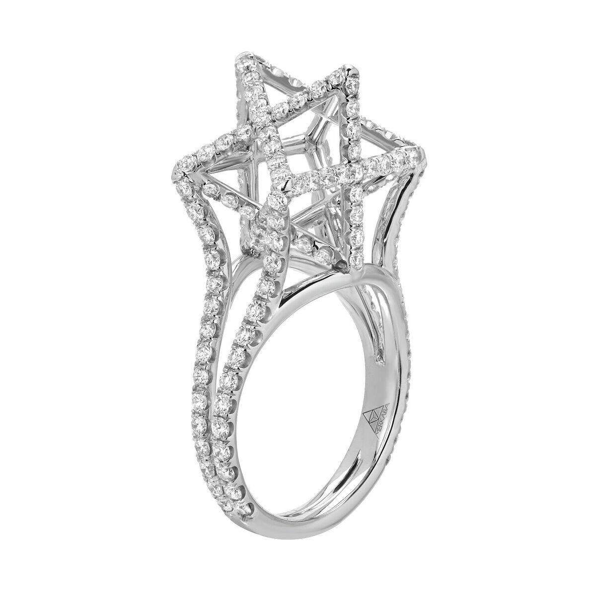 Platinum Diamond Ring - Architectural Merkaba star platinum diamond ring, featuring a total of approximately 2.02 carats of round brilliant diamonds, F-G color and VVS2-VS1 clarity. This dramatic diamond platinum ring design extends upward from the