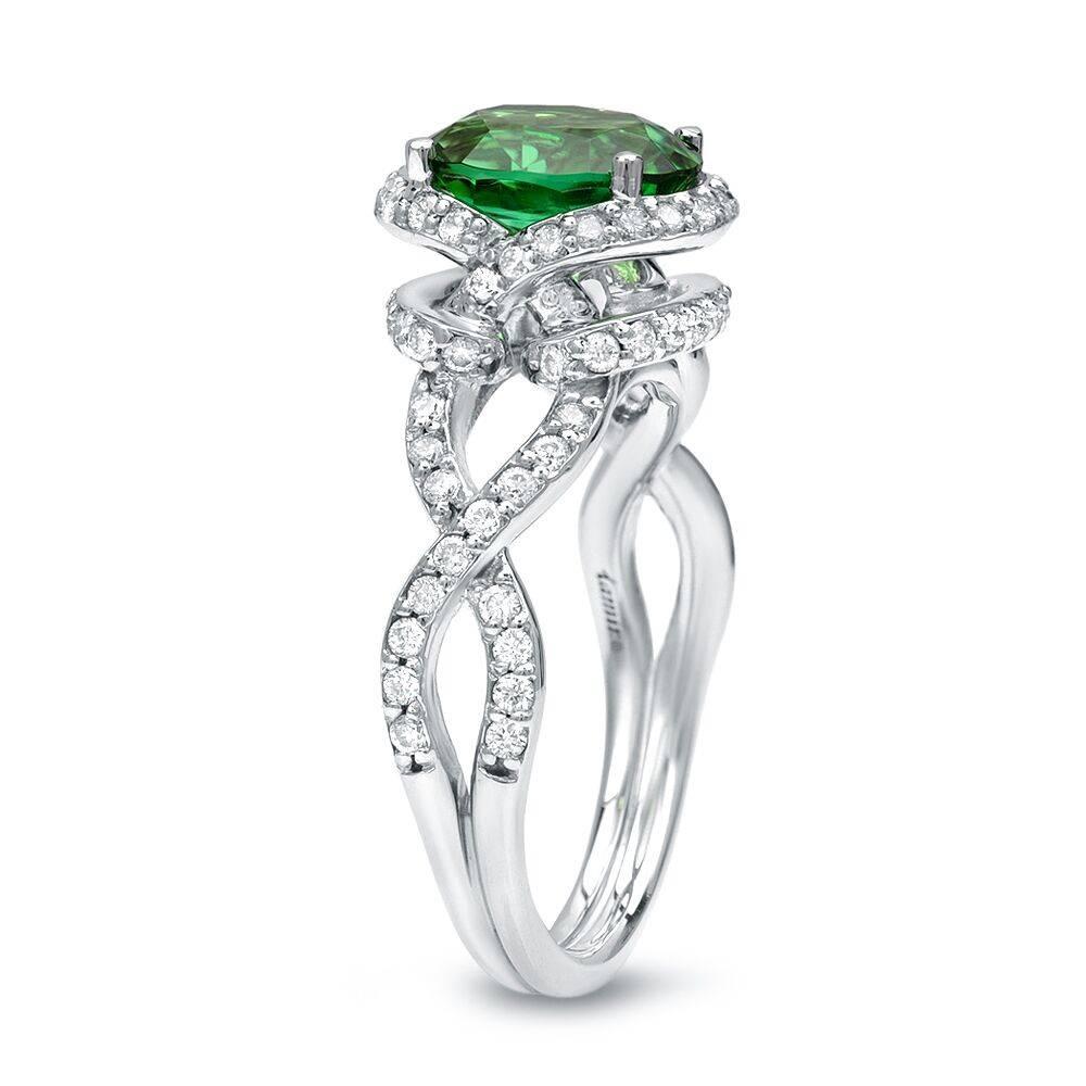 A vivid 1.97ct oval green Chrome Tourmaline, 18K white gold ring, is set with a total of 0.58ct round brilliant diamonds.
Size 6. Re-sizing is complimentary upon request.

Returns are accepted and paid by us within 7 days of delivery.

Colorful