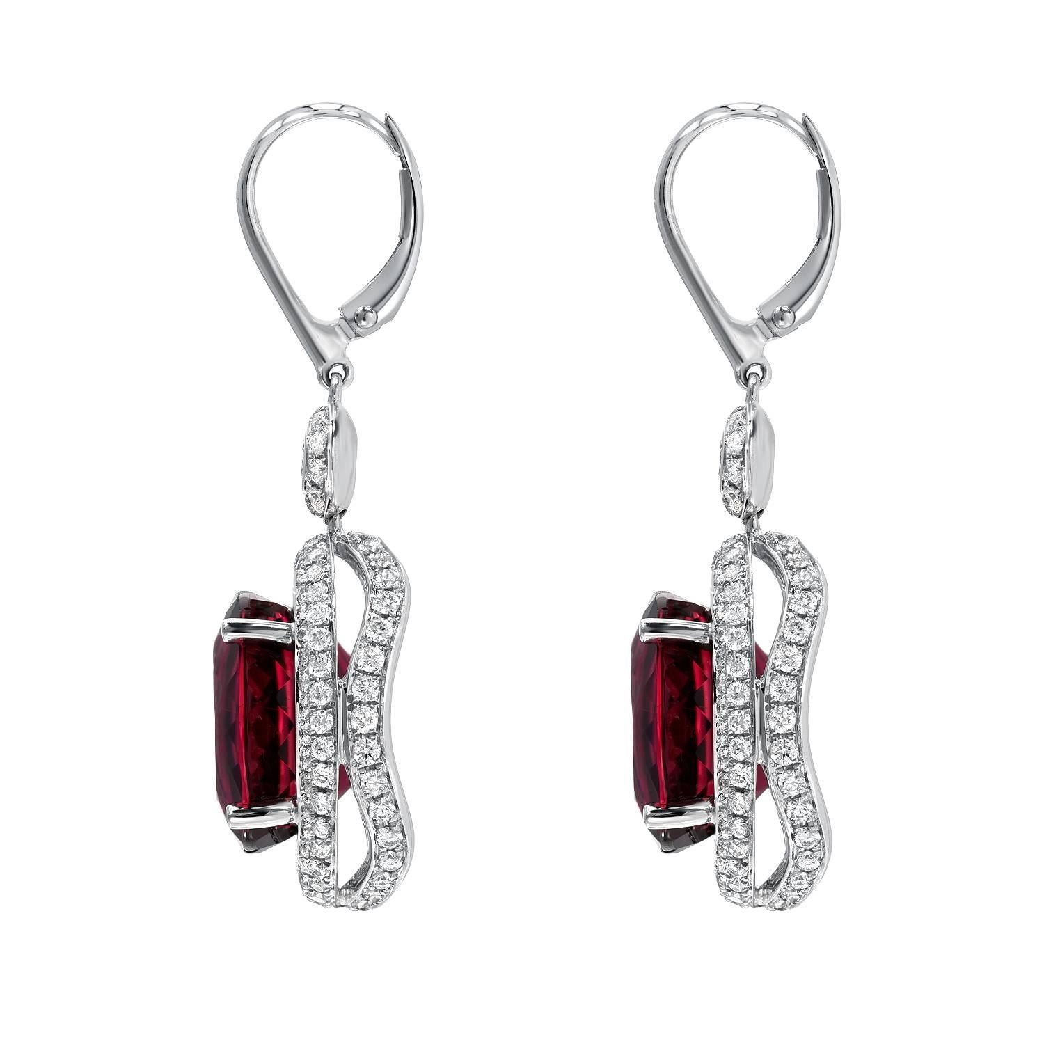 Superb 11.64ct Rubellite Tourmaline oval pair, and a total of 1.62ct round brilliant diamonds, are set in these remarkable 18K white gold, lever back, drop earrings.
Total length: 1.50 inches.