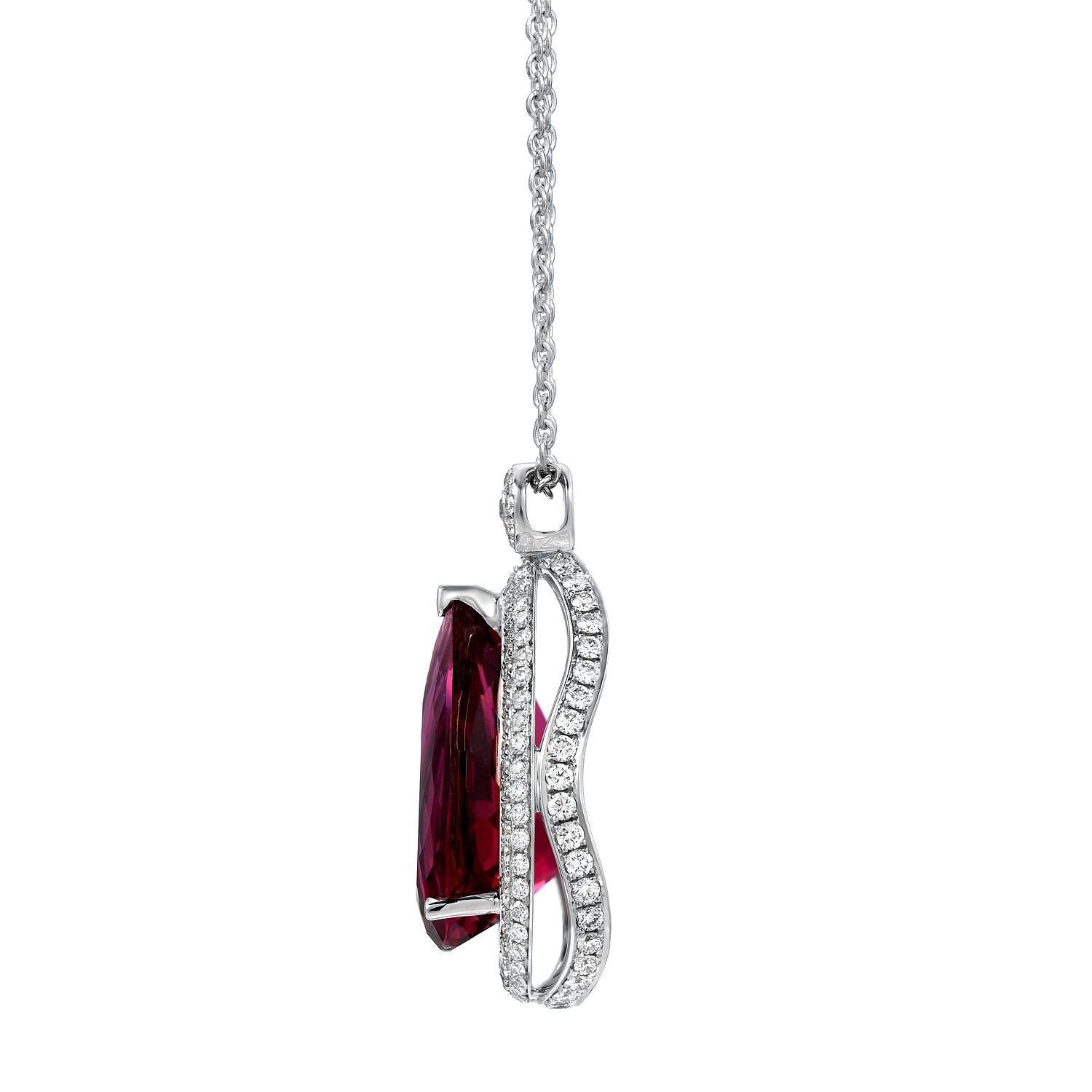 Superb 12.12ct pear shaped Rubellite Tourmaline and 1.26ct total round brilliant diamonds, adorn this striking 18K white gold pendant necklace.
Total chain length: 17 inches. Chain length can be adjusted upon request.