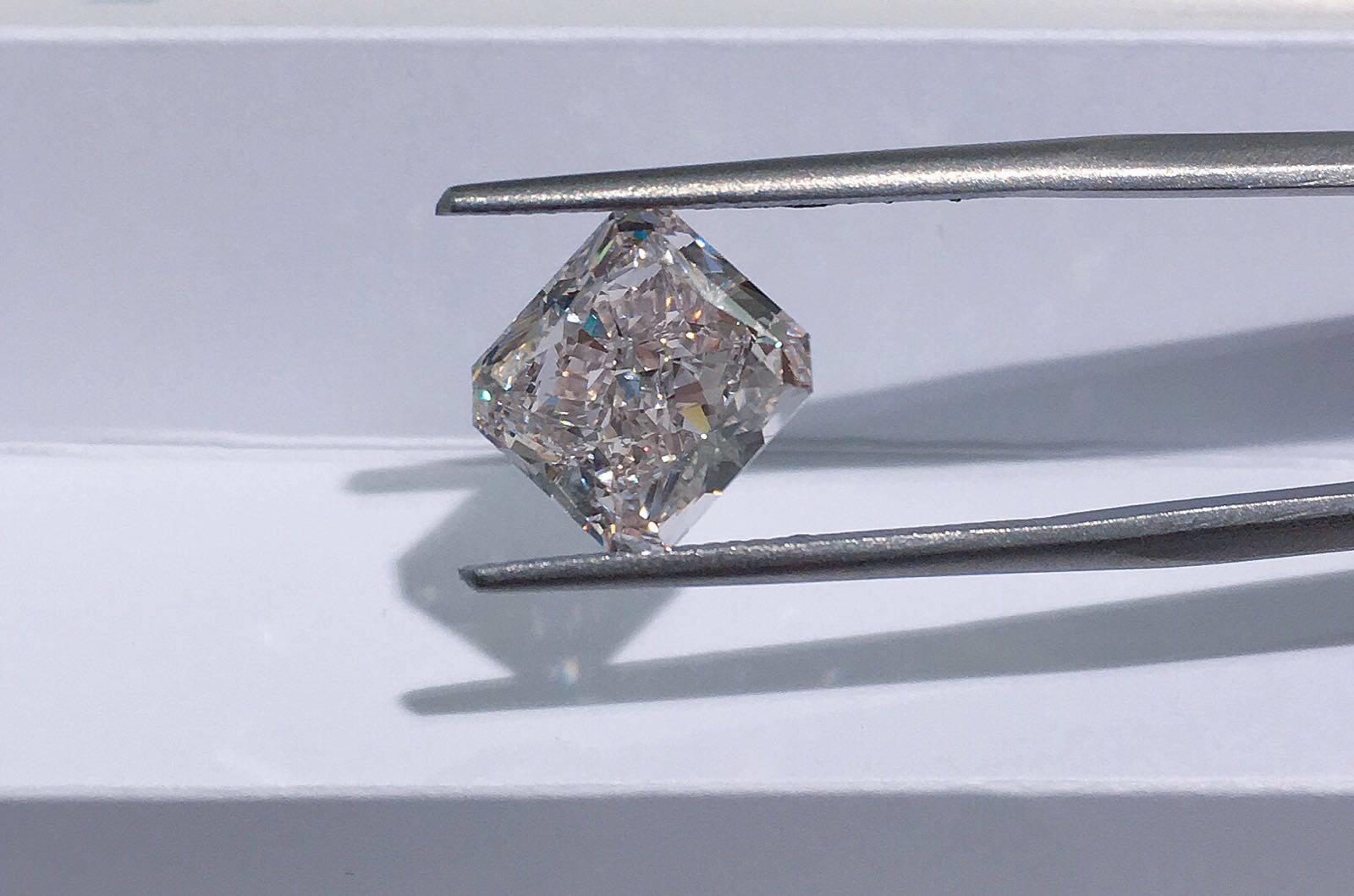 Exceedingly rare, 5.14 carat fancy light pink, radiant cut, VVS1, type IIa loose diamond. 
Type IIa diamonds are the most chemically pure type of diamond and often have exceptional optical transparency.
Examples of famous type IIa diamonds are the