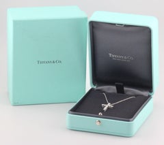Tiffany & Co. Classic Medium Diamond Platinum Cross Pendant Necklace