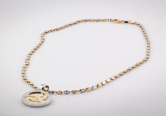 Collana Bulgari con ciondolo “Tondo Snake” in oro 18 carati, acciaio e diamanti