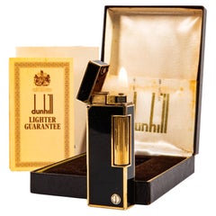 Briquet Dunhill Rollagas vintage, laqué noir, dans sa boîte, 1979