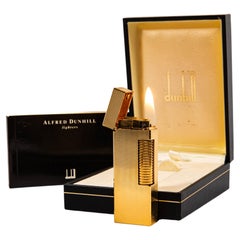 Briquet Dunhill Rollagas vintage plaqué or, dans sa boîte, 1993