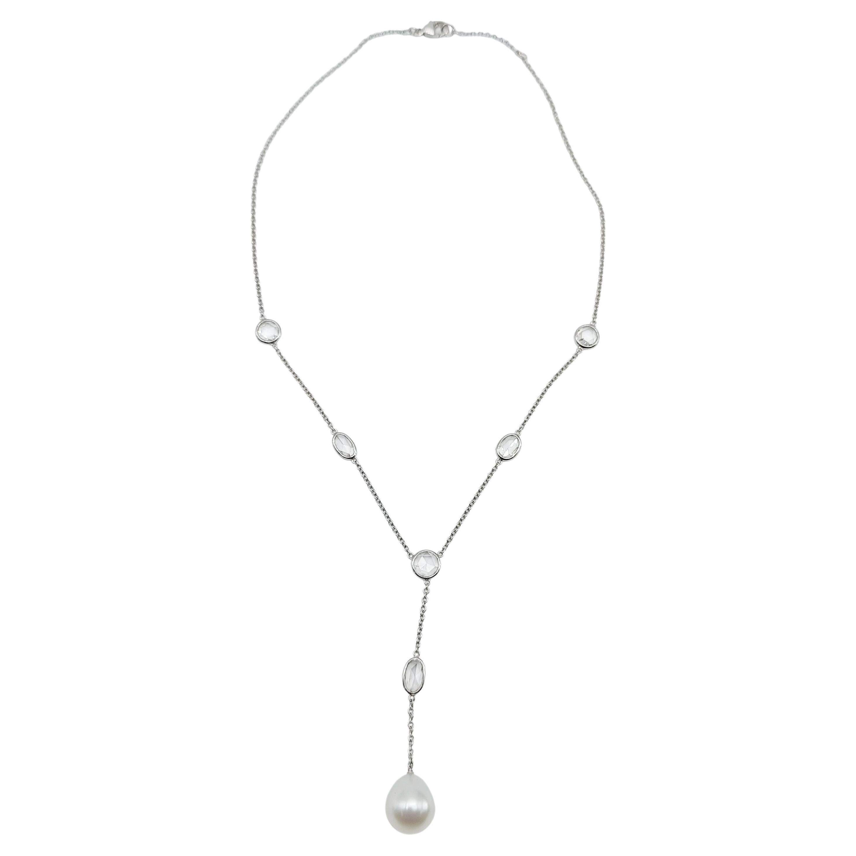 Collana in oro bianco, diamanti e perle