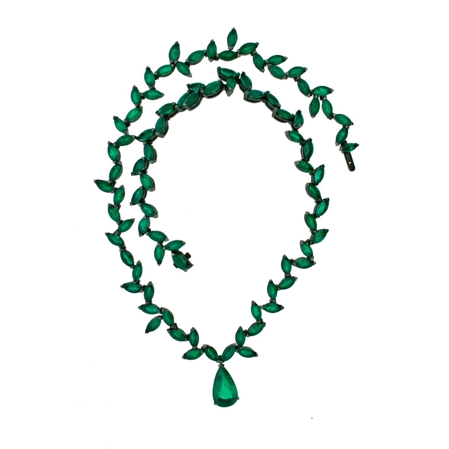 Old Fashioned Necklace from the Stoned collection with marquise emeralds set in 18ct white gold with matt black rhodium finish.
Box clasp with emerald and safety catch at back of necklace. 
Pear Shaped emerald focal point 5.36ct certified by The
