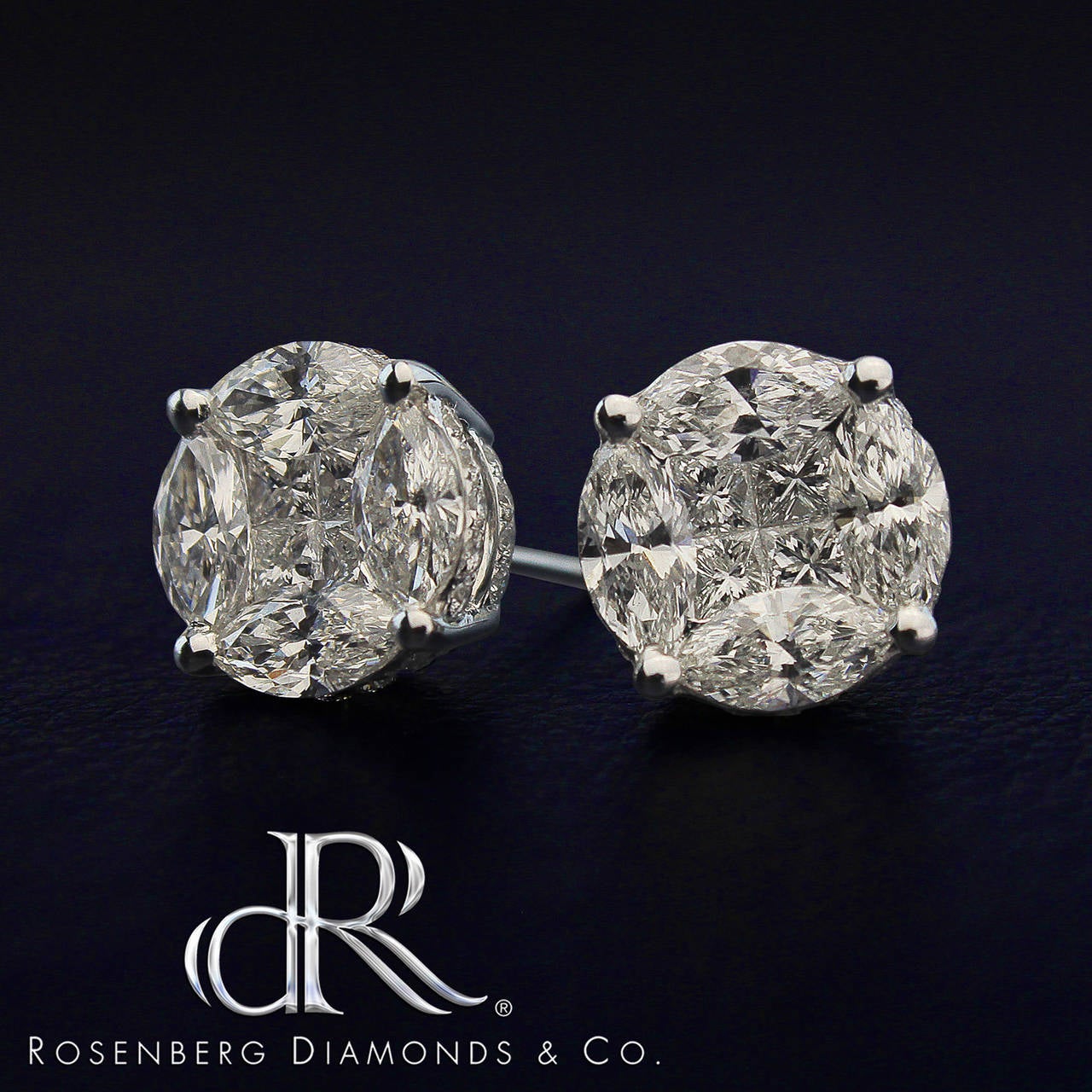 Just in time for the summer for your travels! This beautiful matched pair of diamond illusion studs just under 5ct tw with high quality collection goods, for less than one tenth of the price of single solitaire diamond studs. We also offer the same