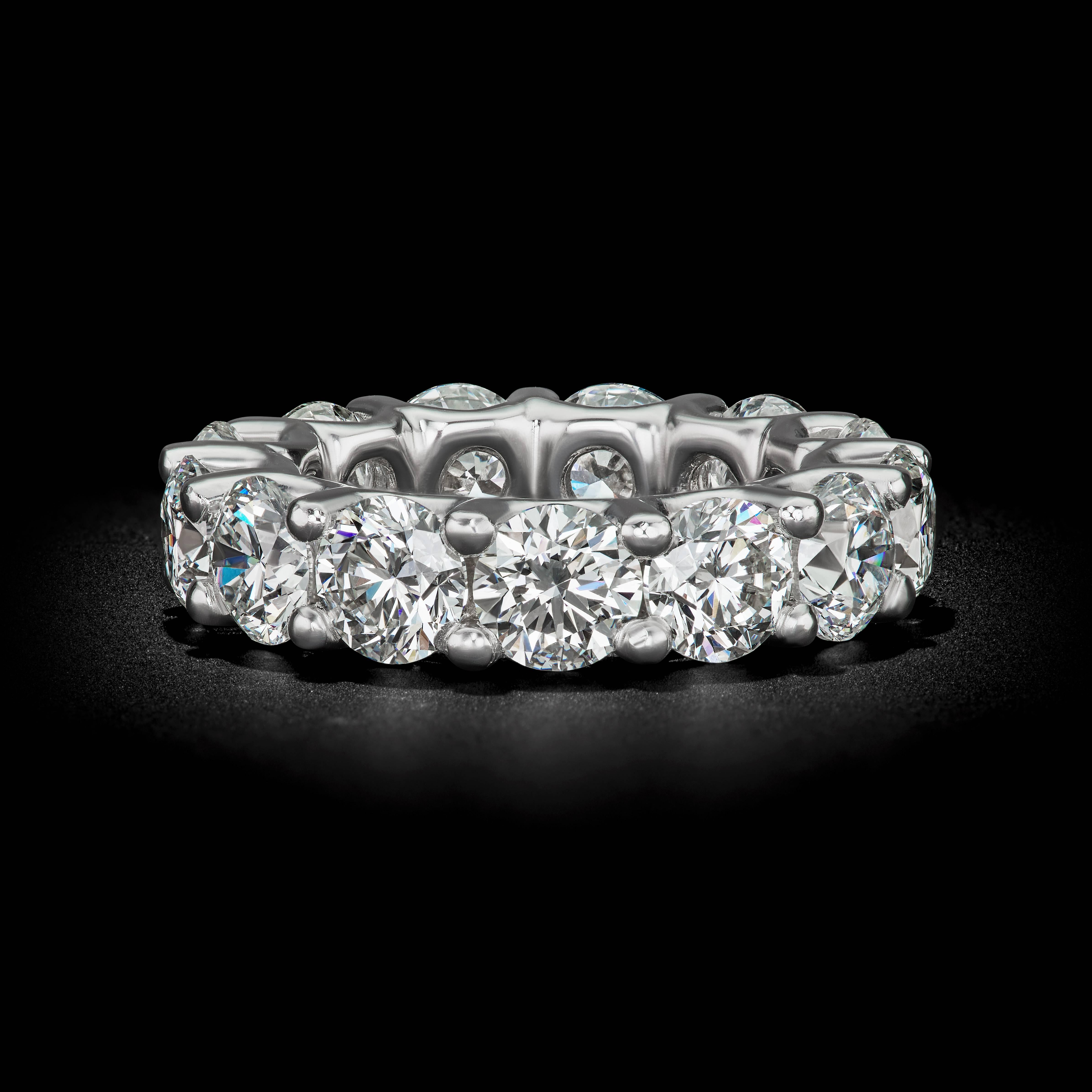 This stunning handmade Platinum eternity band has 13 round stones totaling 9.75 cts. with a color ranging from G-H-I and having a clarity of SI1-2 

David Rosenberg is President of the Diamond Bourse of the Southeastern United States and is a