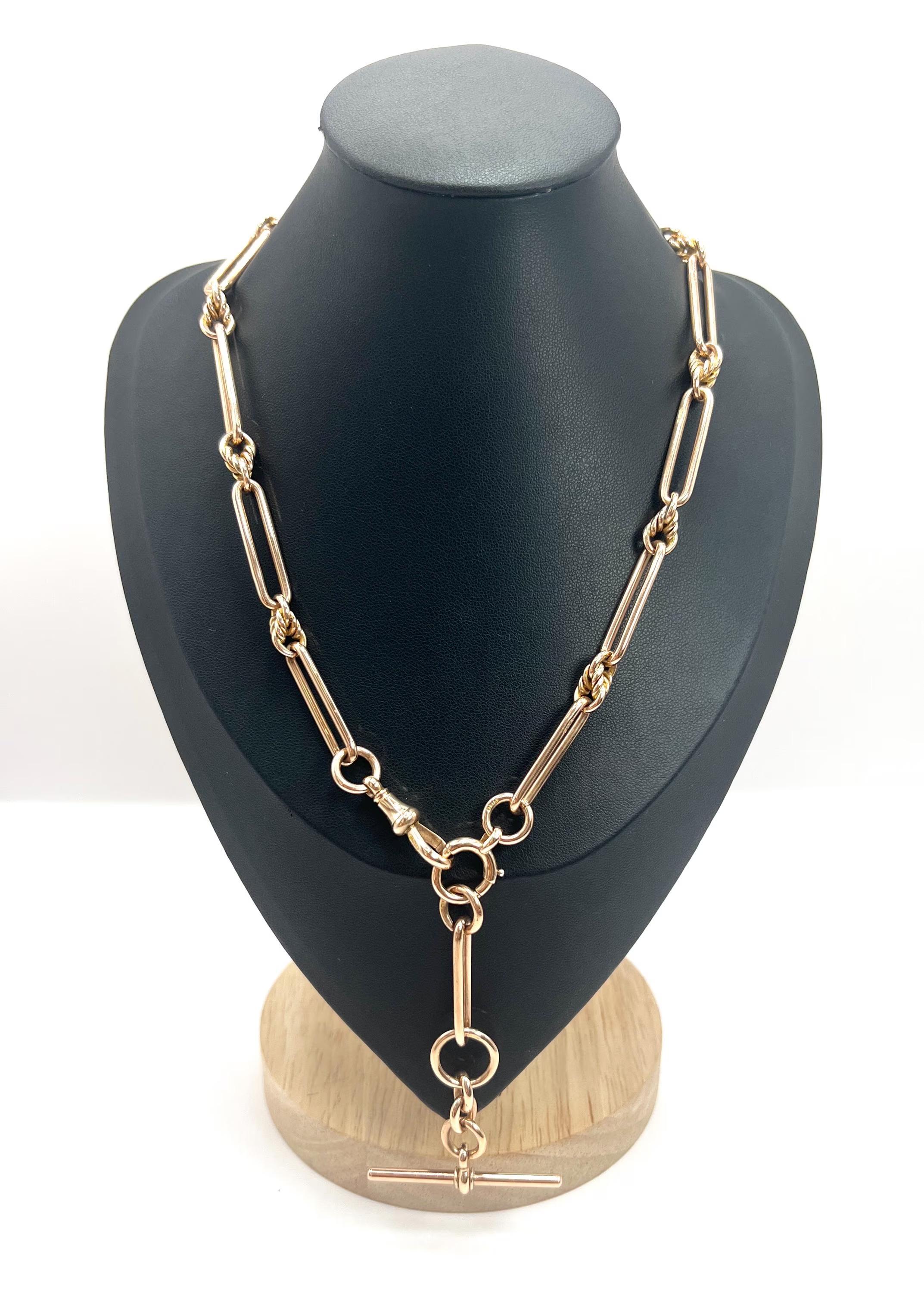 9ct Rose Gold, Edwardian Trombone & Knot Albert Chain, Hallmarked Chester 1910 In Good Condition For Sale In Brighton, GB
