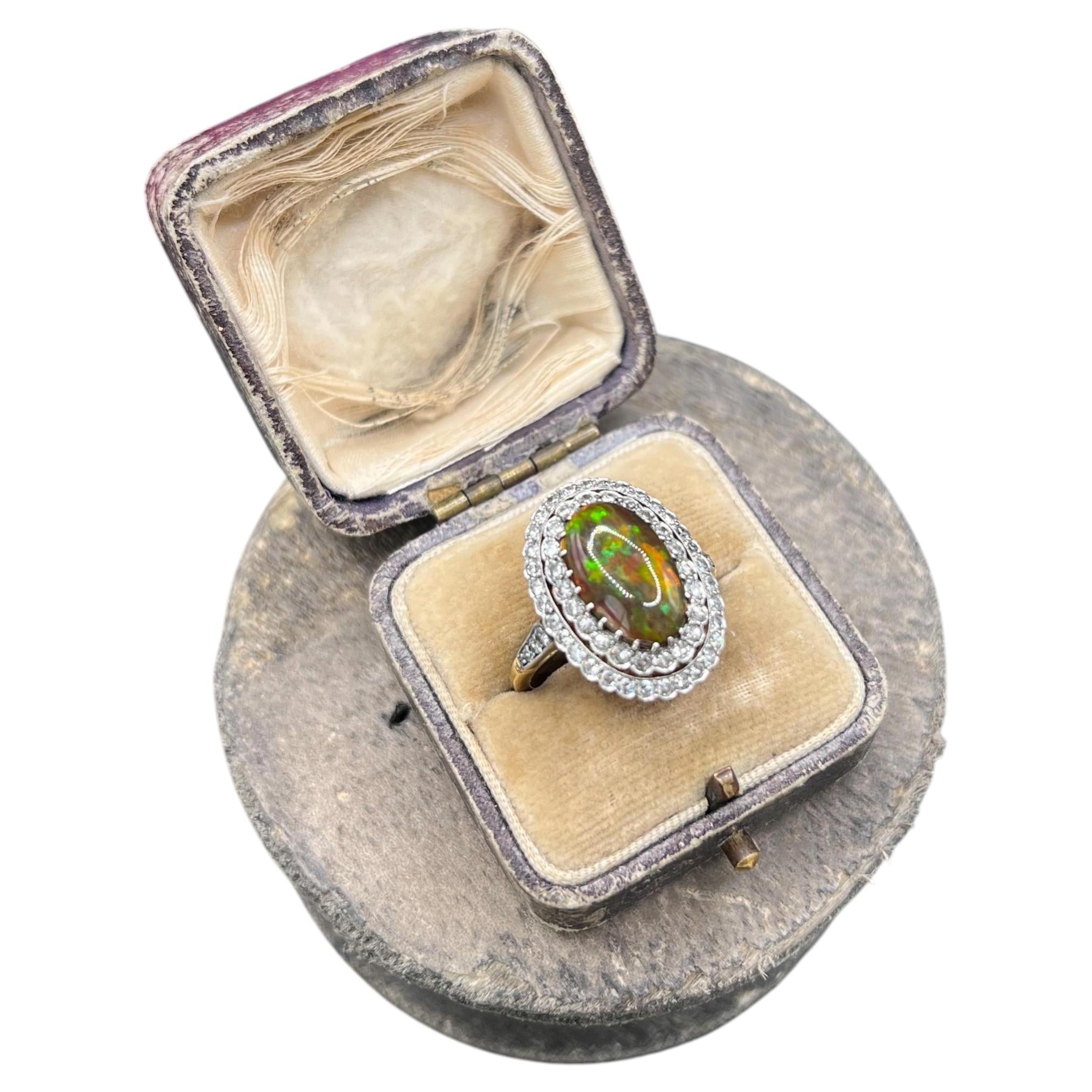 18ct Gold & Platinum, Deco Style Black Opal and Diamond Oval Shaped Cluster Ring For Sale