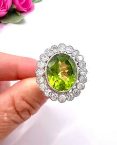 Antique Platinum French Stamped, Edwardian Peridot and Diamond Halo Ring