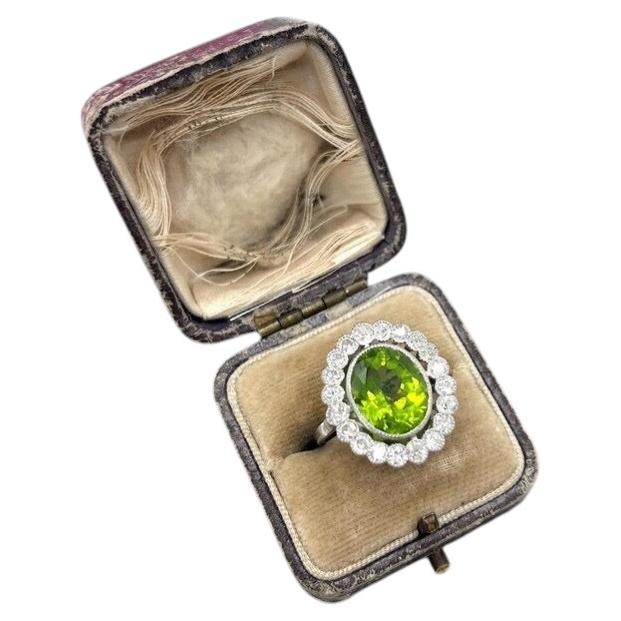 Antique Platinum French Stamped, Edwardian Peridot and Diamond Halo Ring For Sale