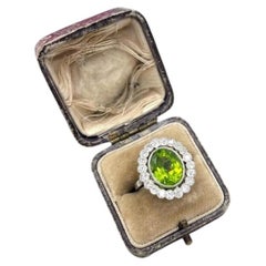 Antique Platinum French Stamped, Edwardian Peridot and Diamond Halo Ring