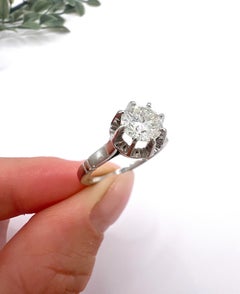 Vintage-Ring aus 18 Karat Gold und Platin mit französischer Punzierung, mit einem einzelnen Diamanten von 0,75 Karat