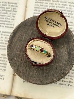 18ct Gold Edwardian, Acrostic ADORE Ring: Amethyst, Diamond, Opal, Ruby, Emerald