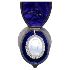 Antique Platinum, Edwardian Mother of Pearl and Diamond Madonna Cameo Pendant