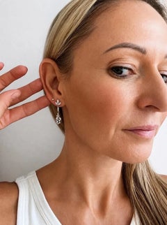Boucles d'oreilles vintage en or 18 carats, des années 1940, en forme de fleur pendante serties de diamants