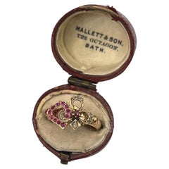 Bague ancienne en or 18 carats poinçonnée, ornée d'un cœur en rubis et de diamants, vers 1900