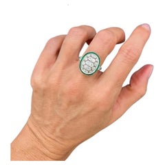 Anillo de oro de 18 quilates y platino, estilo Art Déco, con esmeraldas y diamantes calibrados