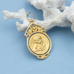 Antique French 18K gold Cherub charm decorated with roses - rare Angel pendant