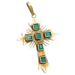 Vintage 18 karat solid gold cross pendant with green natural emeralds