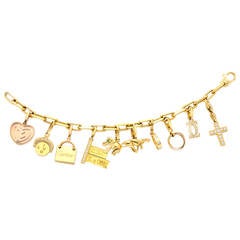 Cartier Gem Set Gold Charm Bracelet