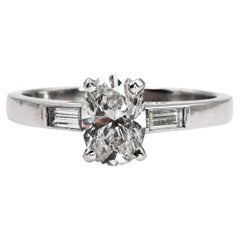 Modern Oval Diamond and Platinum Solitaire Ring, 0.91 Carats