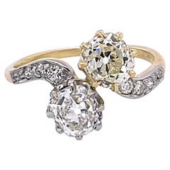 Two Stone Crossover White and Yellow Diamond, Platinum and 18 Karat Gold Ring