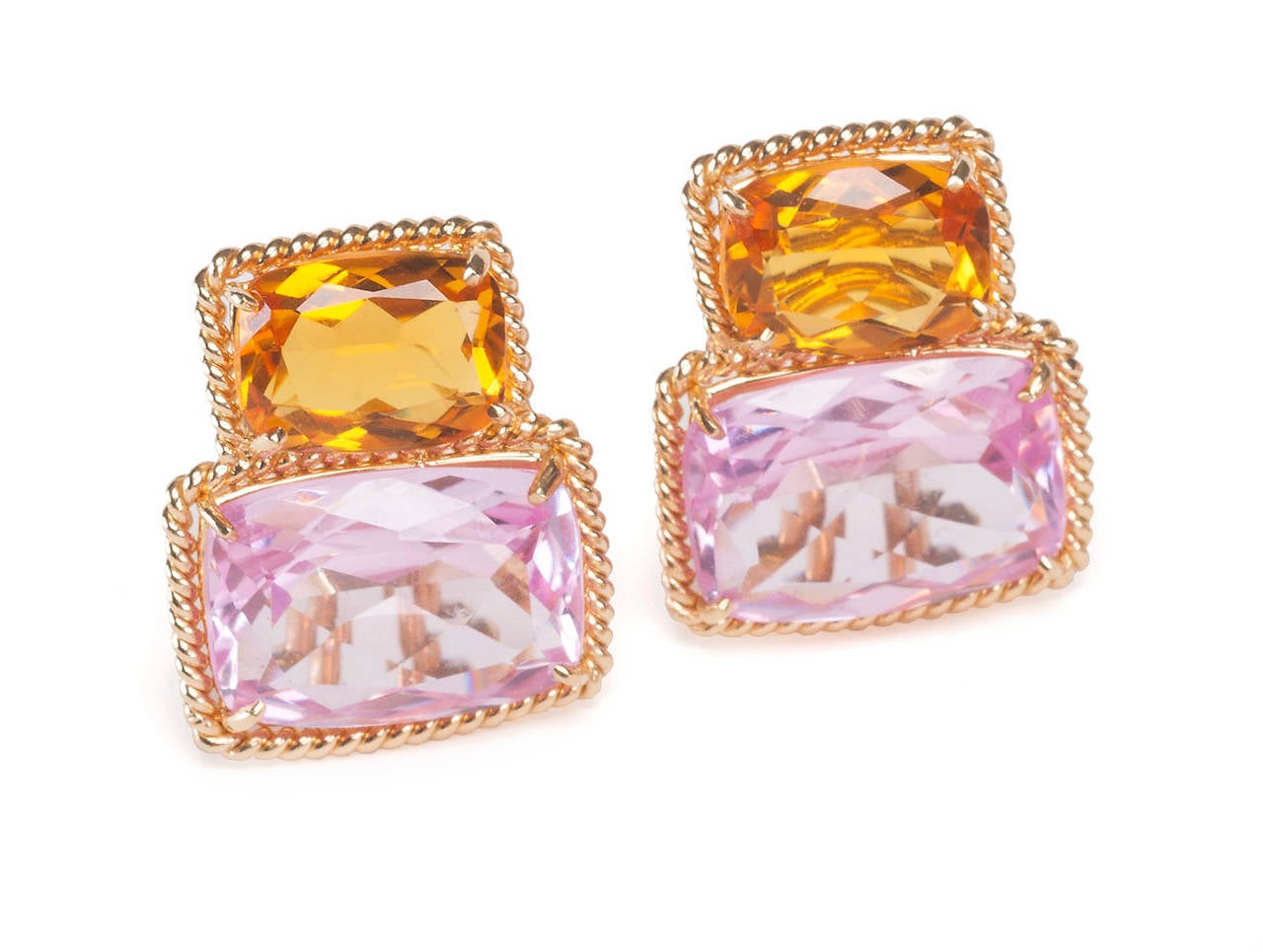 18kt yellow gold two stone earrings with rope twist border with faceted citrine and pink topaz.

Posted earrings with omega clip backs.
Can be made clip for non-pierced ears.

Citrine stone measures .5" wide, pink topaz measures .75"