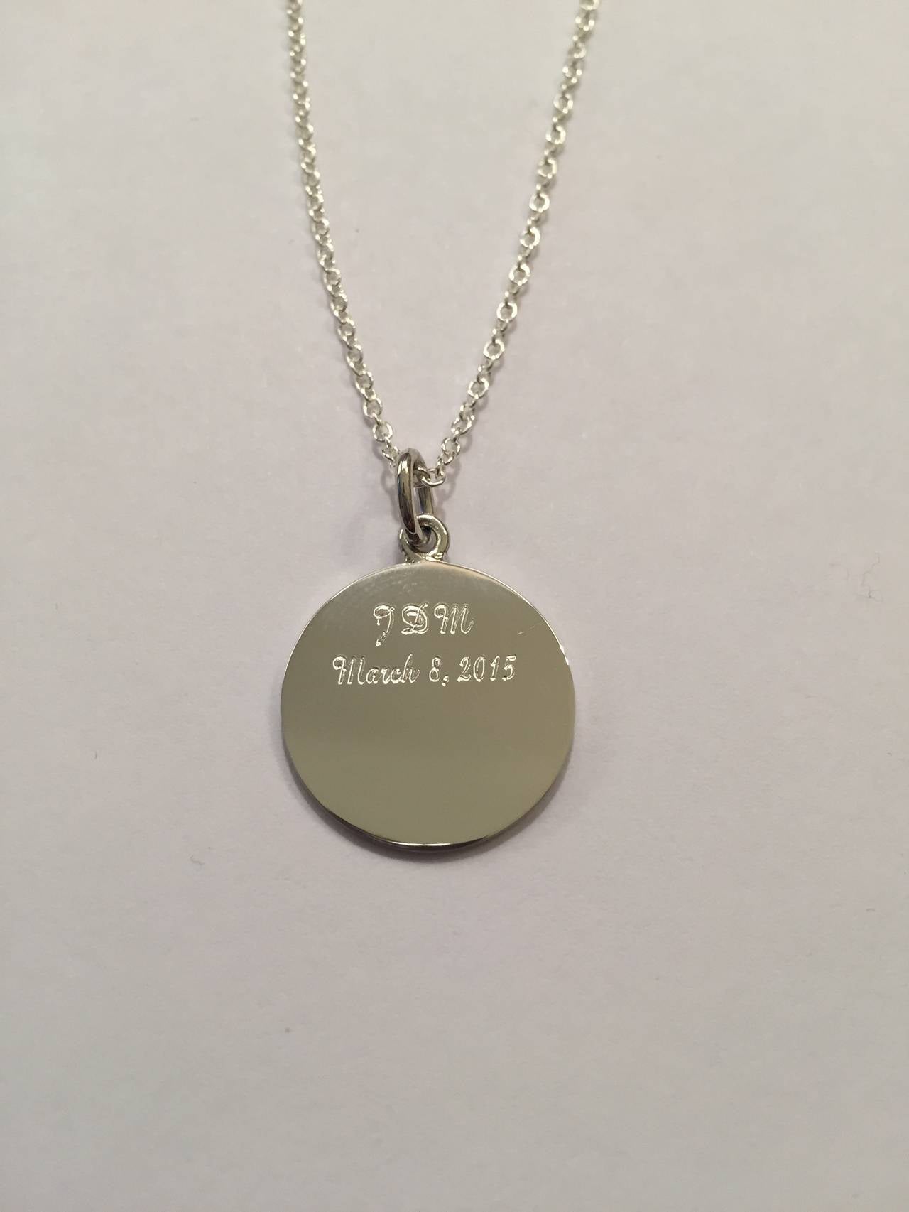Personalized Silver First Communion Pendant Necklace.  We laser engrave your church or school logo on the front and then engrave your child's initials or monogram in the back with the date of the first communion.

3/4